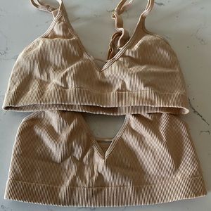 2 nude bras new never worn. Too small for me.